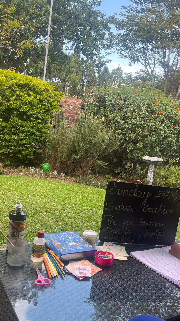 Story books and chalkboard for an English session